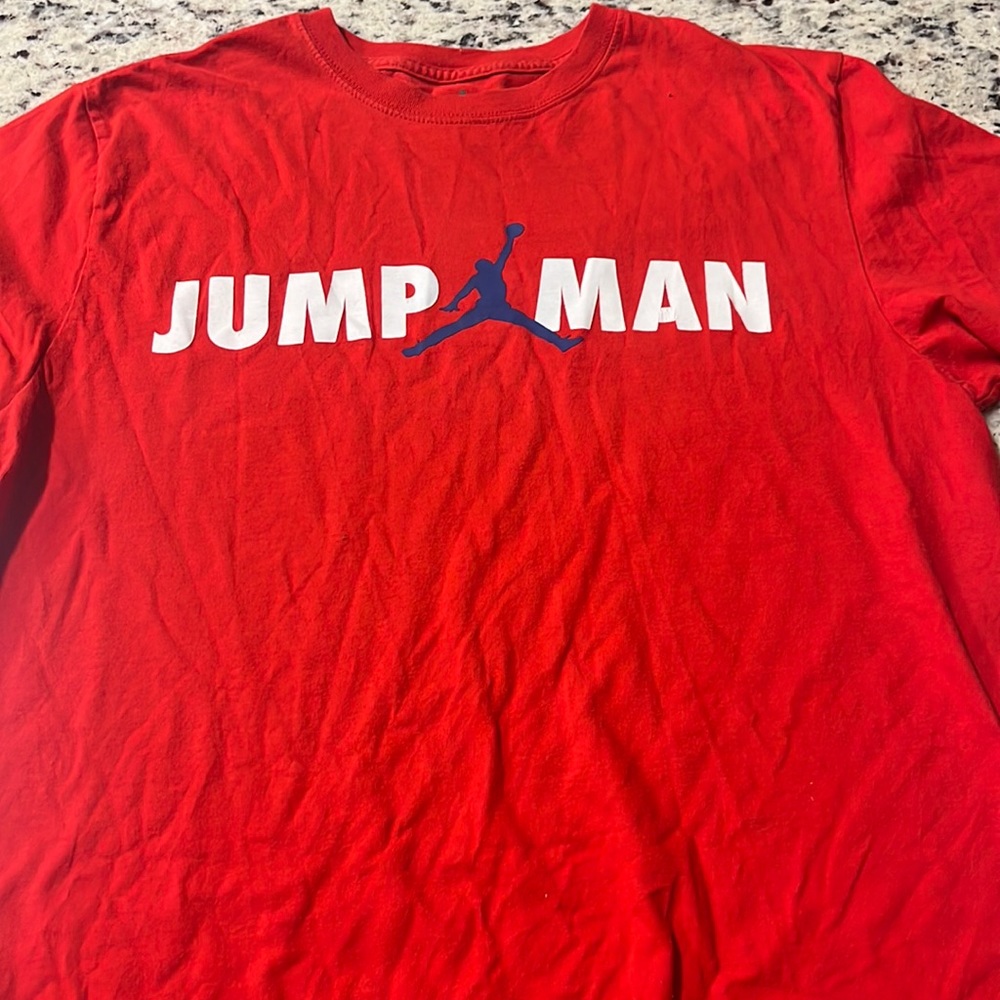 Red jump Man t shirt
